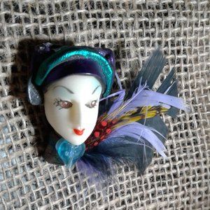 Lady Face Brooch with Feathers